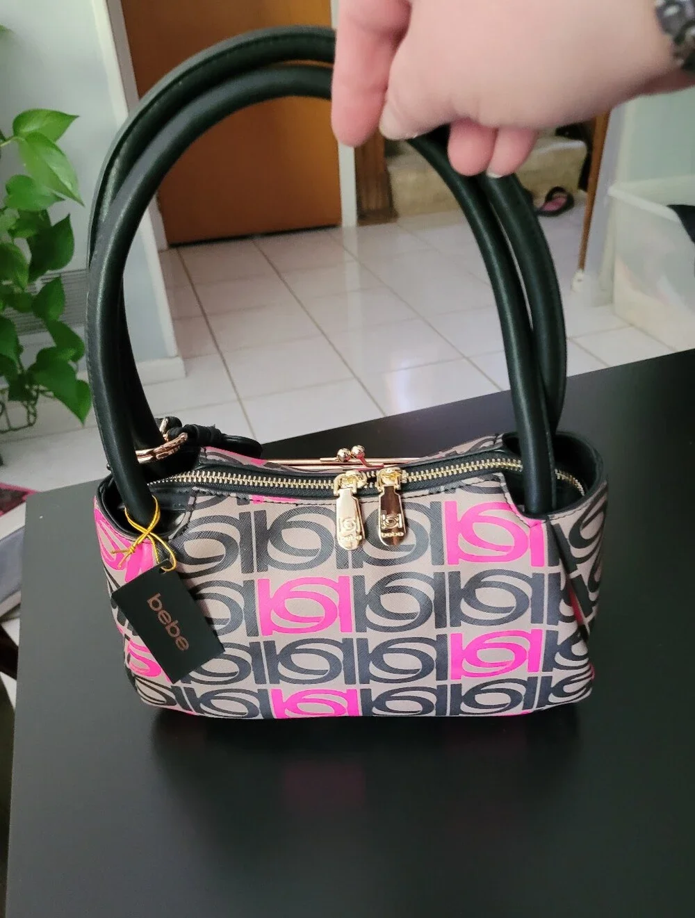 Bebe Women’s Patterned Top-Handle Bag in Black and Pink
